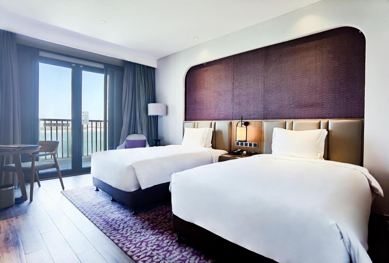 מלון Crowne Plaza Qingdaoorientalmoviemetropolis By Ihg מראה חיצוני תמונה